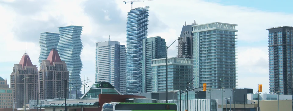 Mississauga City Centre skyline with the Absolute World towers and a GO bus at Square One