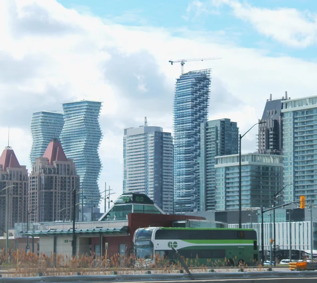 Mississauga City Centre skyline with the Absolute World towers and a GO bus at Square One