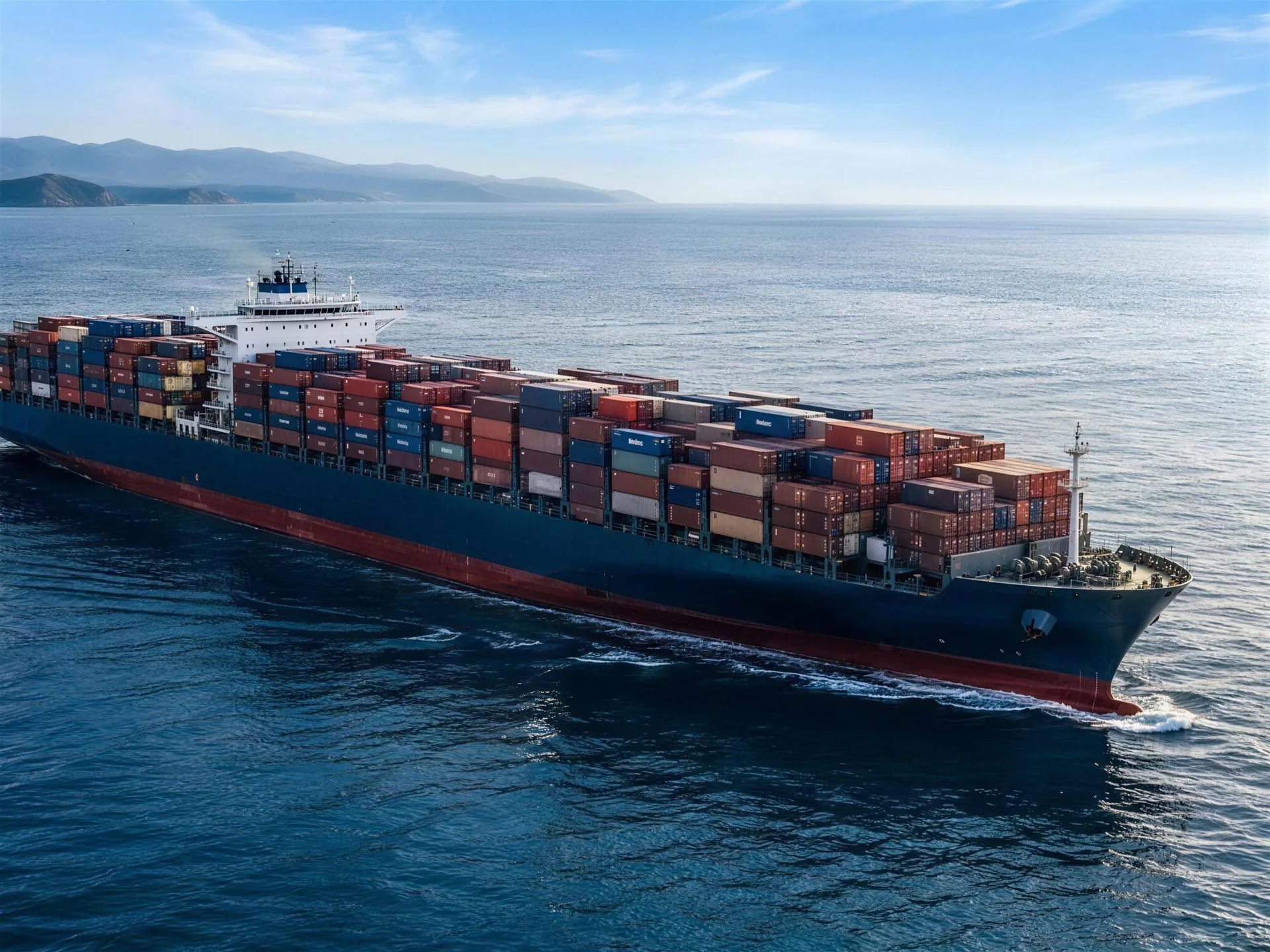 Container ship underway at sea, viewed from above